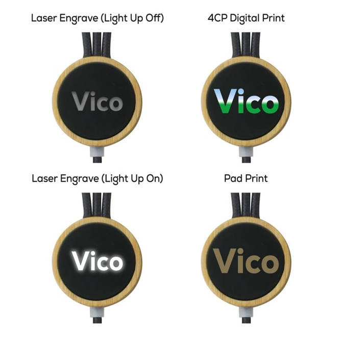 A set of four charging cables with different finishes and designs, featuring a circular black and wood logo area.