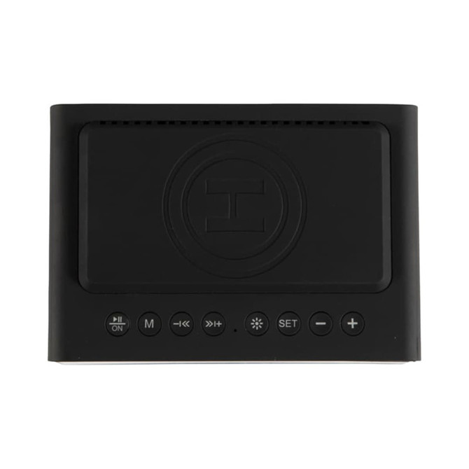 A black wireless charger speaker featuring controls on the front and a logo, designed for charging and alarm functions.