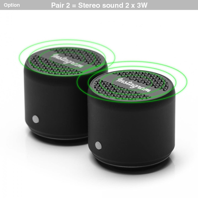 A pair of black Bluetooth speakers featuring a textured grille and a logo on top, designed for stereo sound.