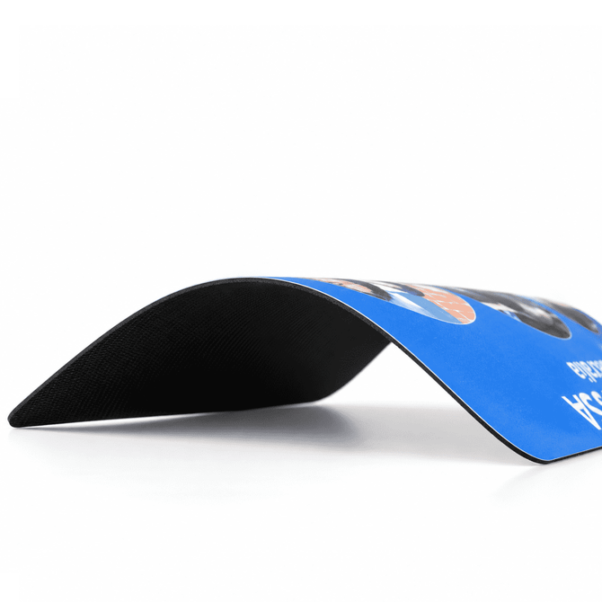 A mouse mat featuring a blue surface and a black underside, made of 1mm thick EVA sponge.