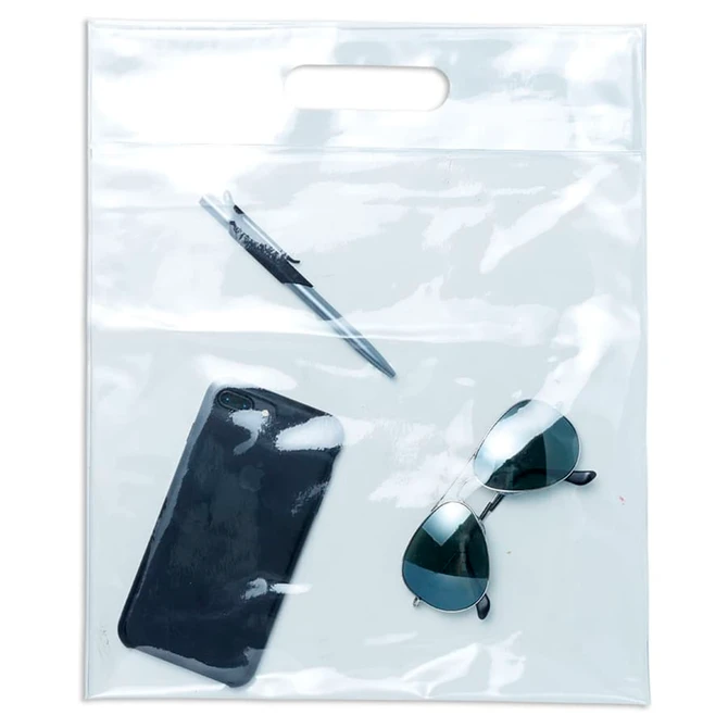 A clear tote bag containing a pen, sunglasses, and a mobile phone. The bag has a handle and a sleek design.