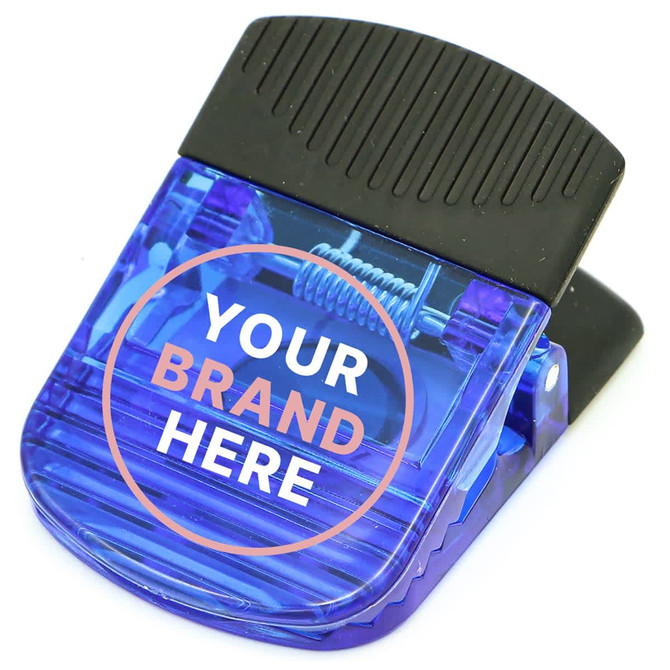 A blue magnetic clip with a textured black grip and a branding area. Suitable for office use.