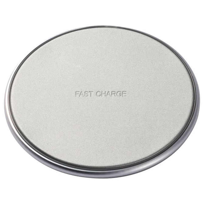 A round, silver fast wireless charger with a smooth surface. The charger features a branding logo in the centre.