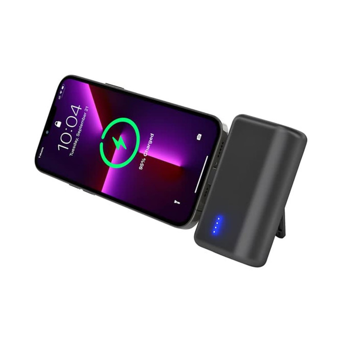 A grey power bank stand with a mobile phone displaying a charging icon, featuring an indicator light.
