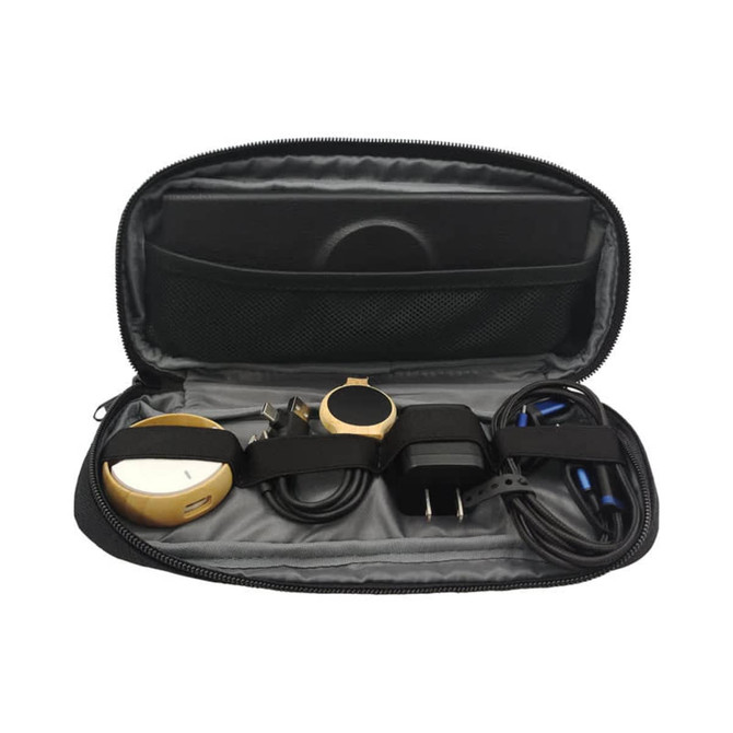 A black eco accessory pouch containing various cables, a plug, and a round device secured with straps.
