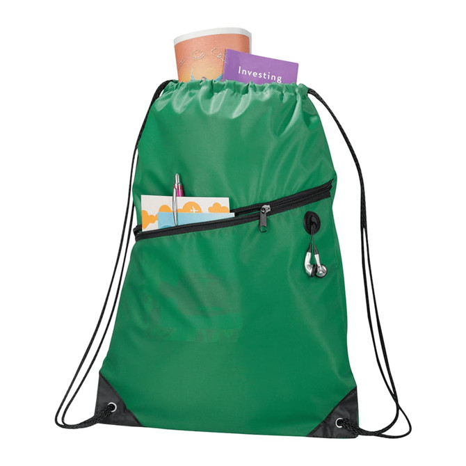 A green drawstring bag with a zip pocket, holding a drink bottle, pen, and small cards. It has a logo.