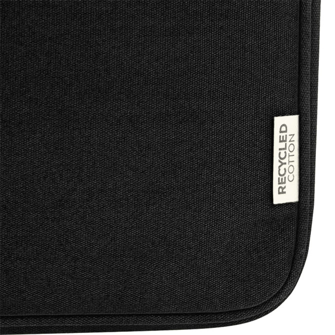 A black laptop sleeve made of recycled canvas with a textured finish and a small tag.