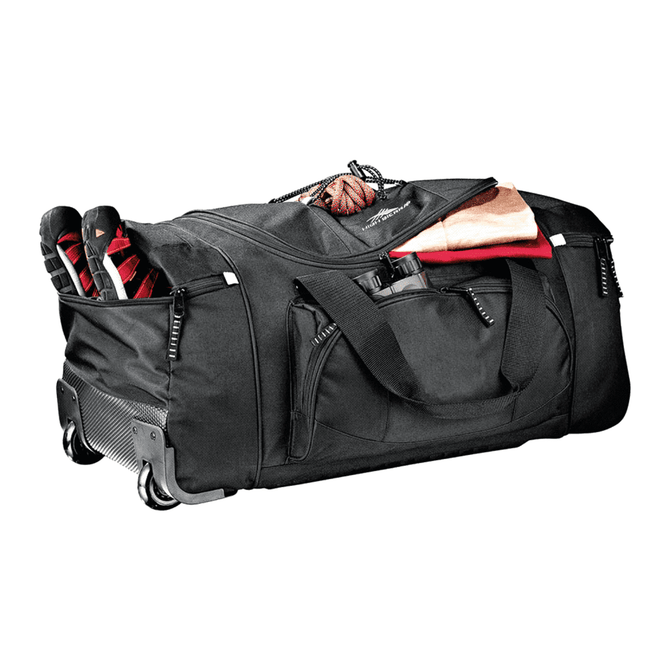 A black wheeled duffel bag with multiple compartments, featuring shoes and sports equipment partially visible.
