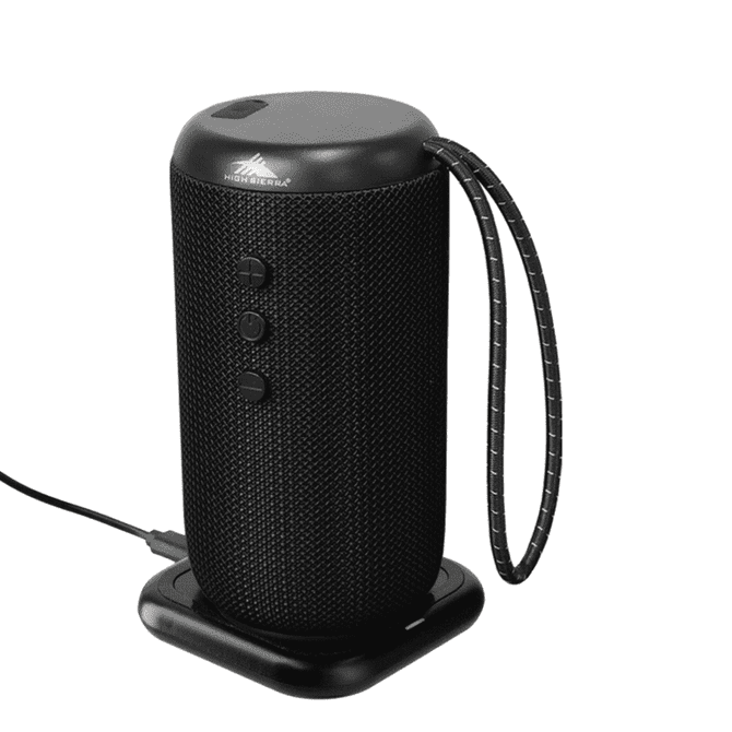 A black, cylindrical outdoor Bluetooth speaker with a textured surface and a handle, positioned on a charging dock.