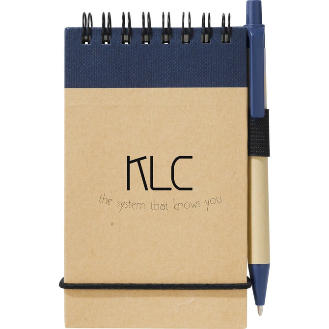 A recycled notepad with a blue cover, black spiral binding, and a pen attached, featuring a logo.