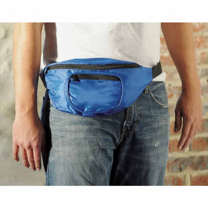 A blue fanny pack is worn around the waist, featuring a front zip pocket and an adjustable strap.