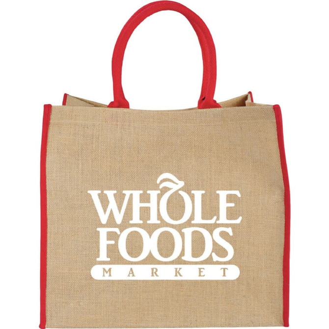A large jute tote bag in natural colour with red handles, featuring a logo on the front.