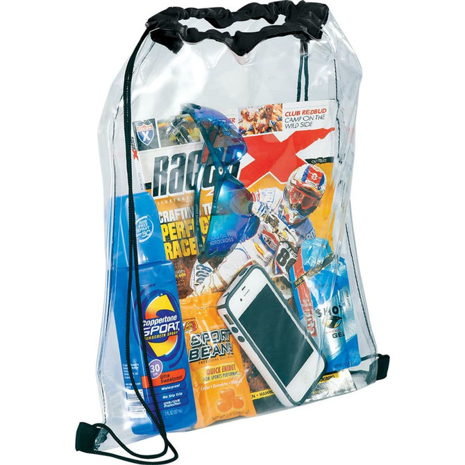 A clear drawstring sportspack contains sunscreen, an energy gel, a drink bottle, and a smartphone. It features a logo.