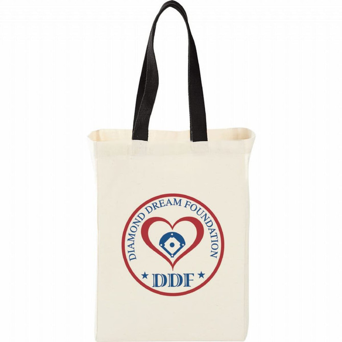 A natural cotton grocery tote in cream with black handles and a logo featuring a heart and text.