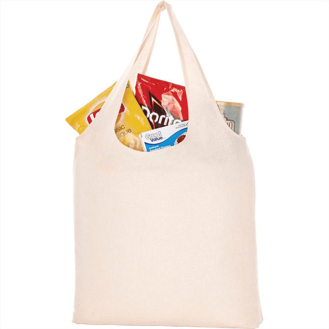 A cream-coloured canvas tote bag filled with snack items, featuring a logo.