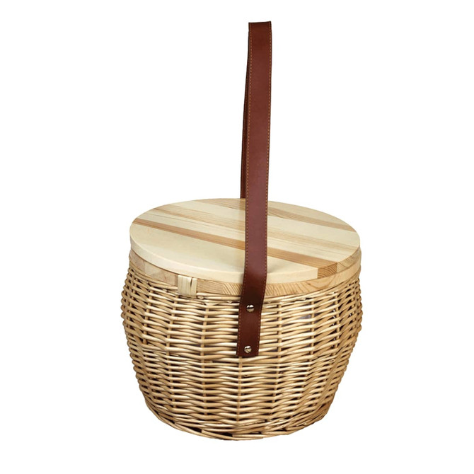 A wicker cooler basket in natural tones with a wooden lid and a brown leather strap. Contains no visible items.