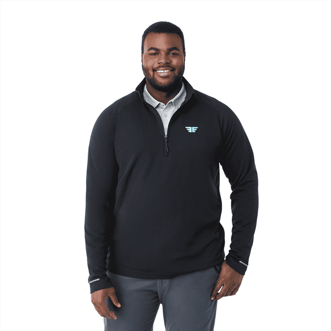 A man wearing a black eco-friendly quarter zip jacket with a logo on the chest, standing against a white background.