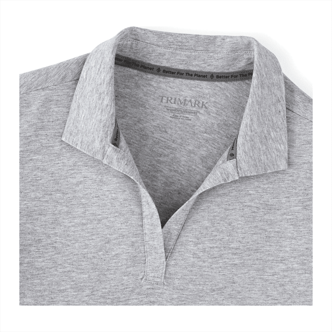 A grey women's polo shirt with a collar and branding on the inside neck.