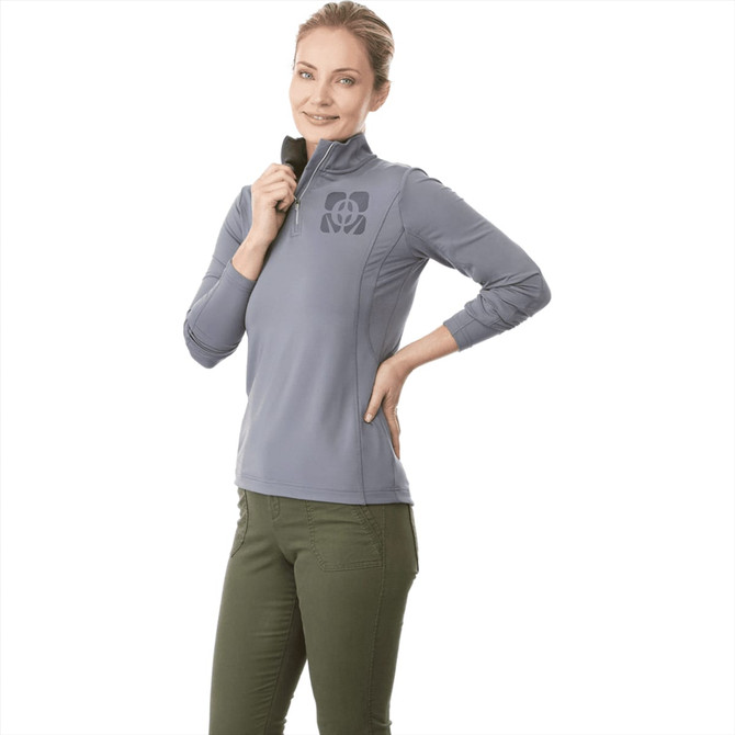 A women's grey quarter zip jumper with long sleeves and a logo on the front.