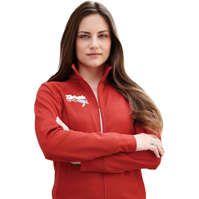 A woman wearing a red knit jacket with a zippered front and a logo on the chest.