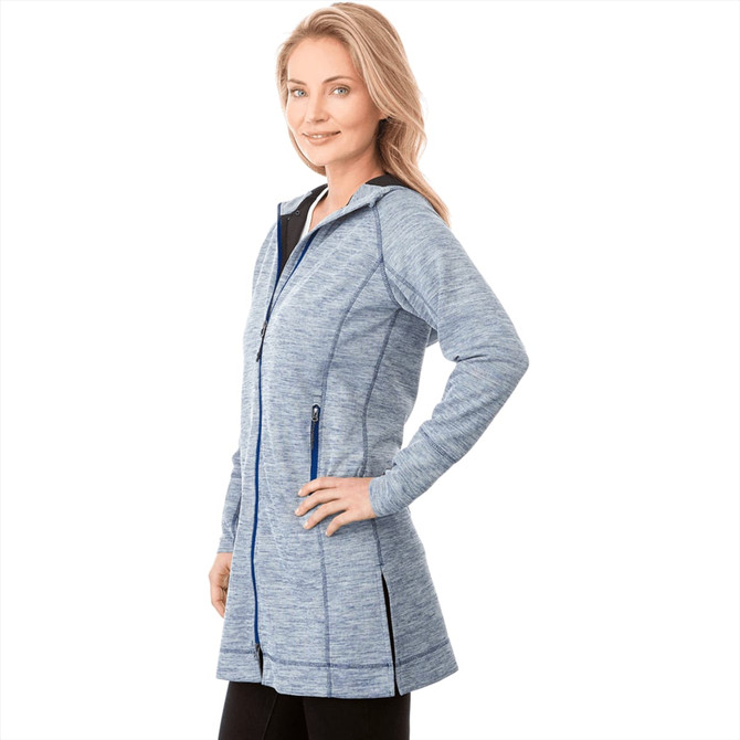 A women's zip hoodie in a light blue marled fabric, featuring a hood and subtle branding, styled with a slim fit.