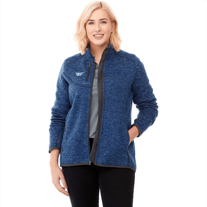 A women's knit jacket in blue with a zip-up front and a logo on the chest.