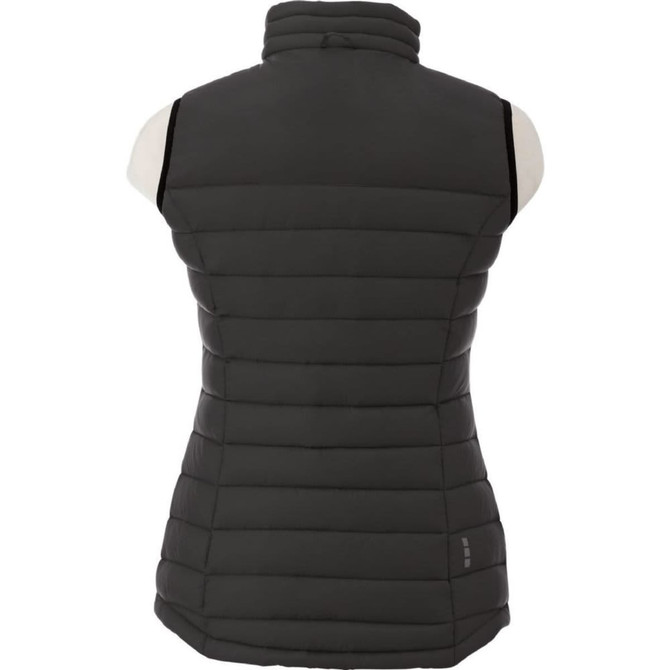 A women's down vest in dark grey, featuring a zip-up design and puffy quilted texture. Includes a logo on the side.