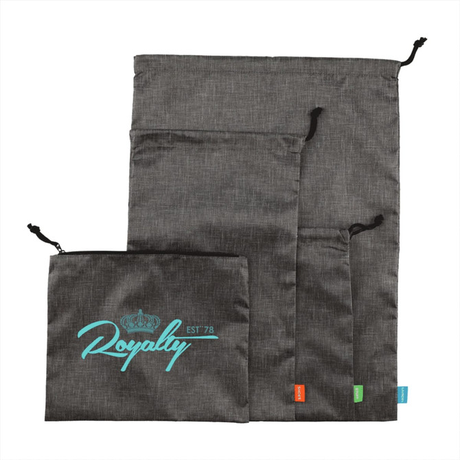 A set of grey toiletry bags in various sizes, featuring a logo on the largest bag.