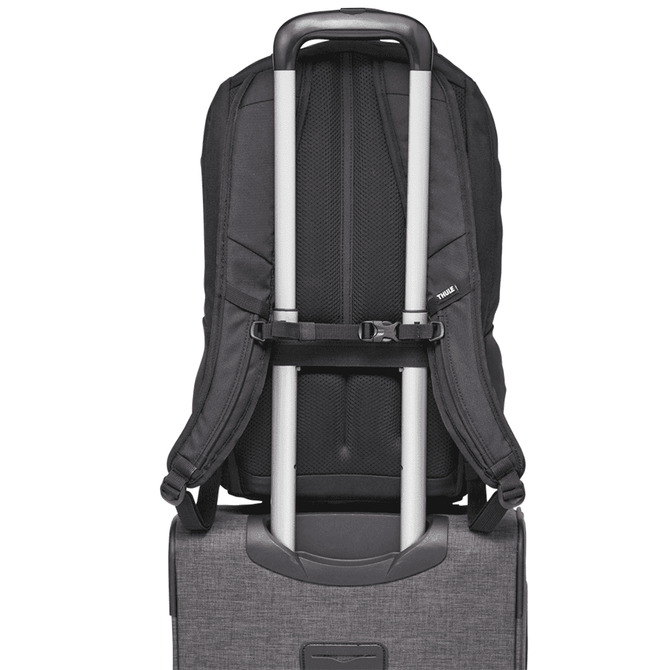 A black computer backpack with adjustable straps, featuring a trolley handle passthrough and ventilation panels.