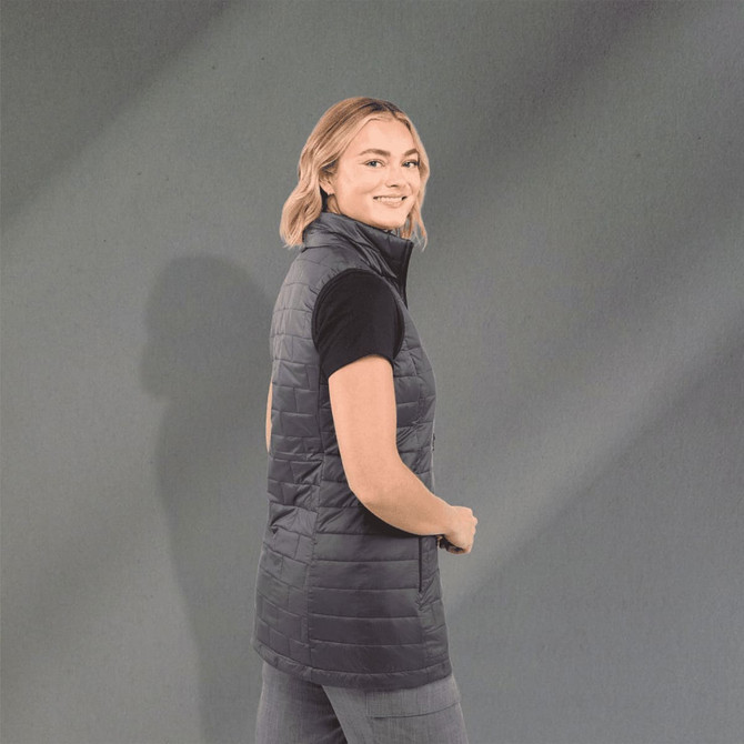 A lightweight, packable insulated puffer vest in dark grey, featuring a high collar and a fitted design.