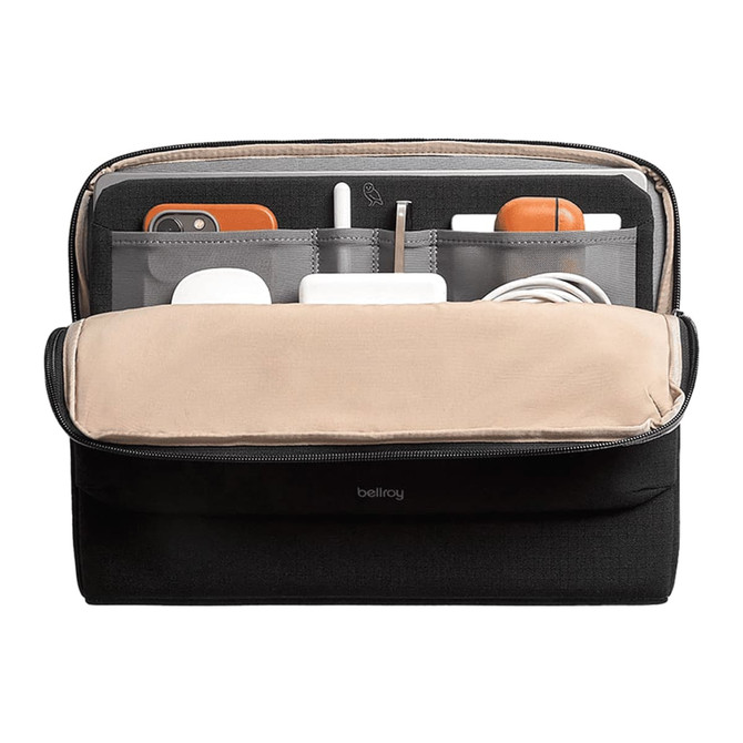 A black laptop caddy with a beige interior, featuring multiple compartments for devices and accessories.