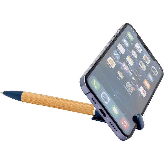 A blue pen with a bamboo body holding a smartphone upright, showcasing its sleek design and functionality.