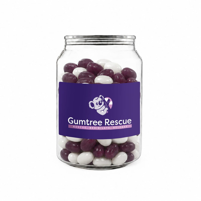 A clear jar filled with purple and white jelly beans, featuring a logo on the front.