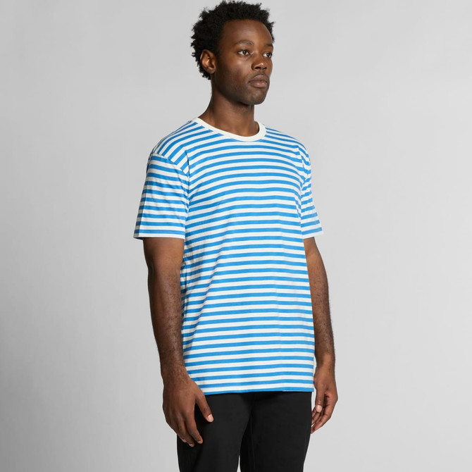 A striped blue and white T-shirt on a model, featuring short sleeves and a relaxed fit. There is a logo on the shirt.