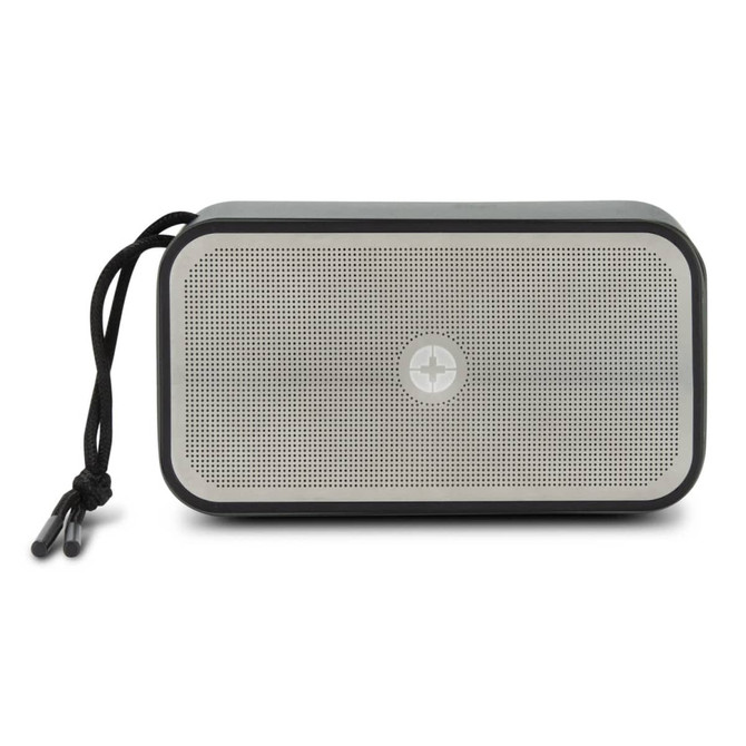 A rectangular grey bass speaker with a mesh front and a black cord attached for easy carrying.