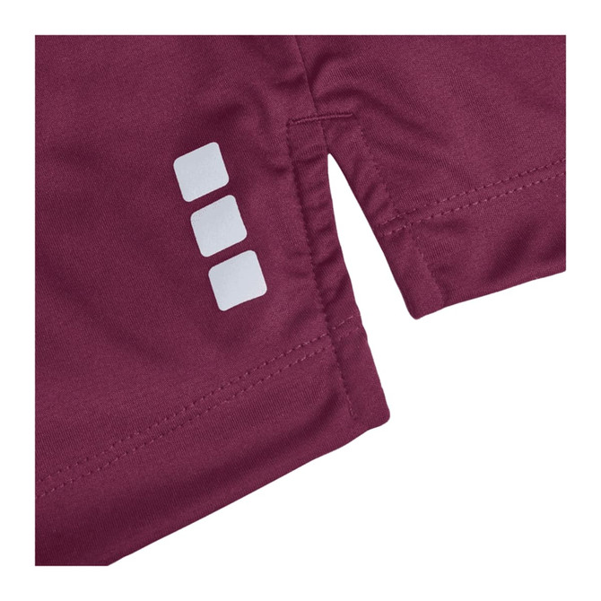 A maroon short sleeve polo shirt with a logo on the sleeve and three decorative white squares.