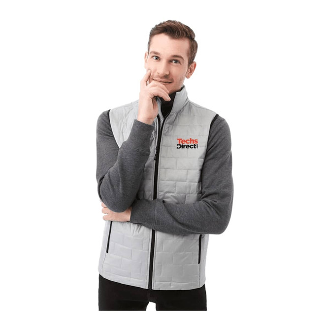 A lightweight packable insulated puffer vest in grey, featuring a zip front and two side pockets, with a logo.