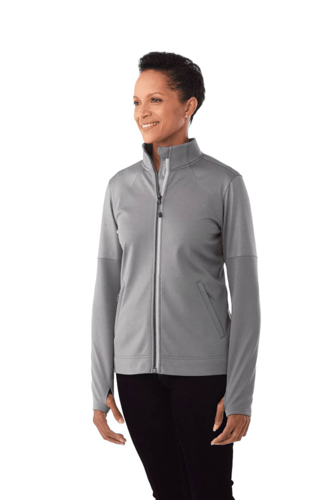 A women's full zip performance jacket in grey, featuring thumb holes and a sleek design, with a logo on it.