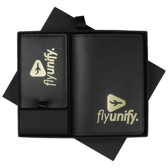 A black leather travel gift set featuring a wallet and luggage tag, both with a logo.