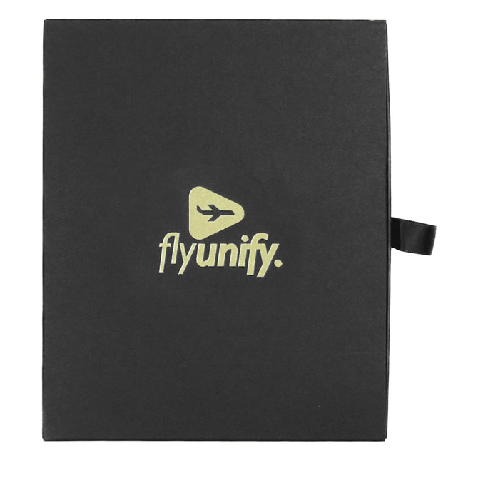 A black travel gift set box featuring a logo, designed for luggage tags and travel accessories.