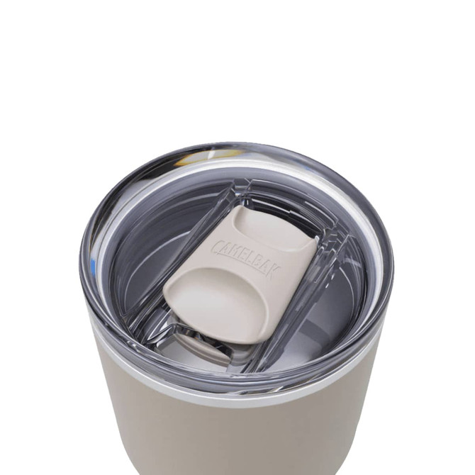 A drink bottle featuring a lid with a spout, in a light beige colour, with a clear rim and a logo.