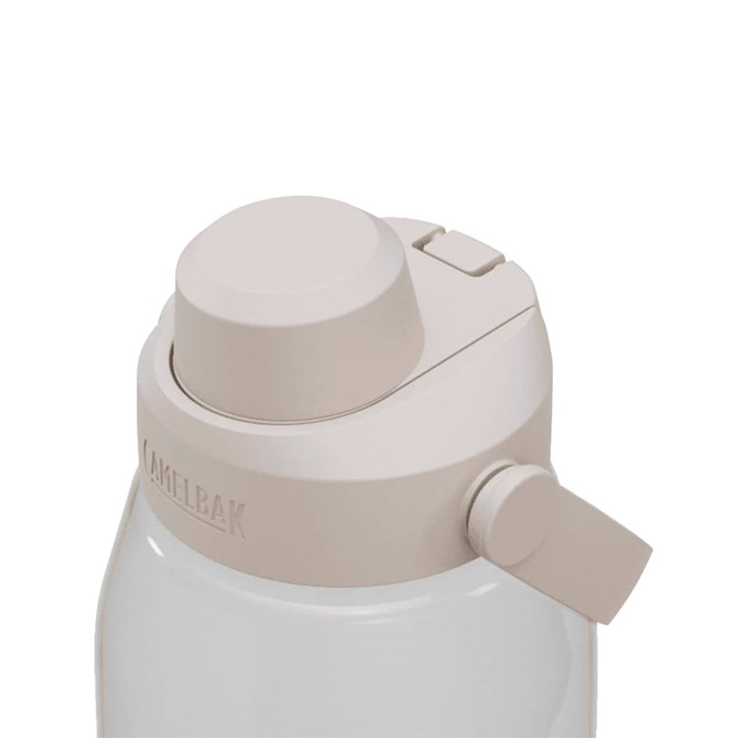 A drink bottle in a light beige colour with a secure top and a side lever. It features a branding logo.