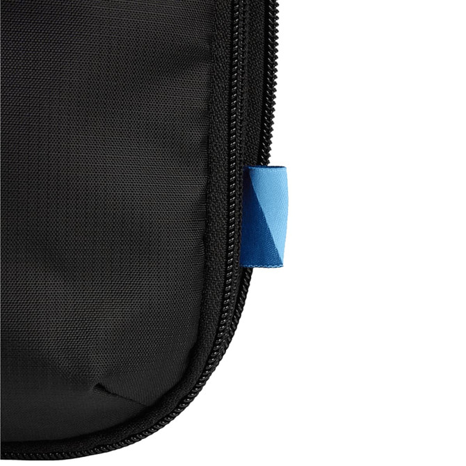 A black packing cube featuring a blue zipper pull, designed for organising and compressing clothes and travel items.