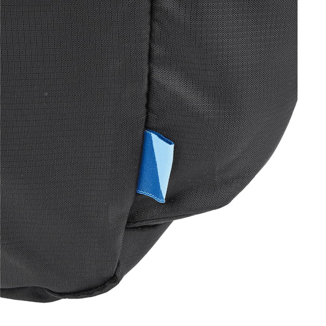 A packable travel duffel bag in black with a small blue tag, featuring a simple and durable design.