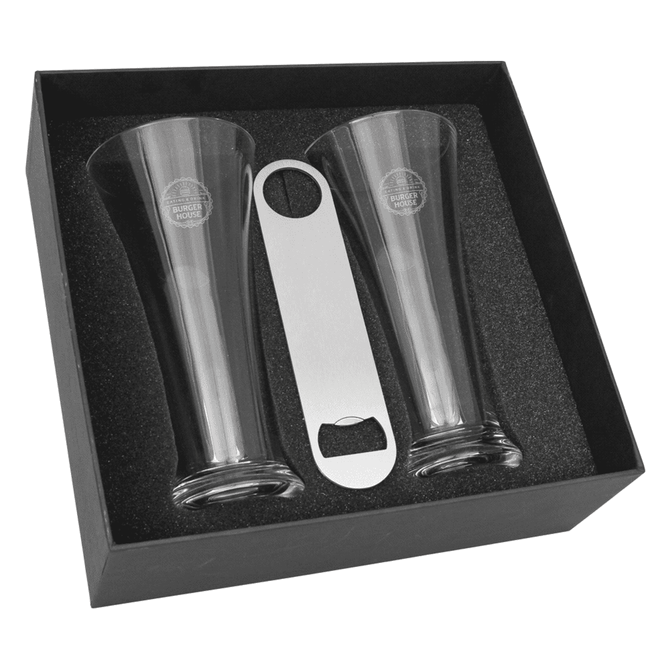 A Pilsner beer glass set featuring two clear glasses and a stainless steel bottle opener, all presented in a black box.