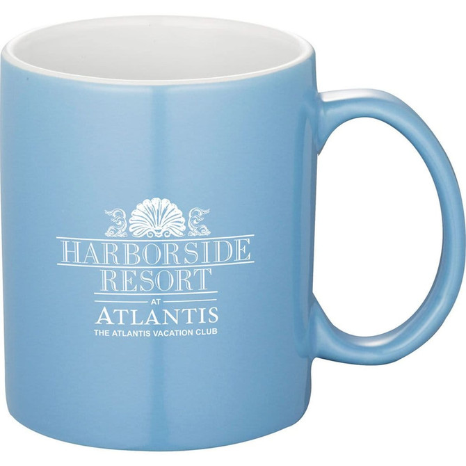 A blue ceramic mug with a handle and a logo printed on its side, featuring a white interior.