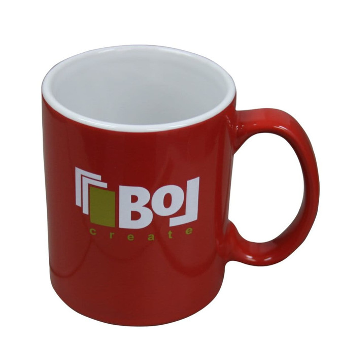 A red ceramic mug with a white interior and a logo on the side. Holds 325ml.