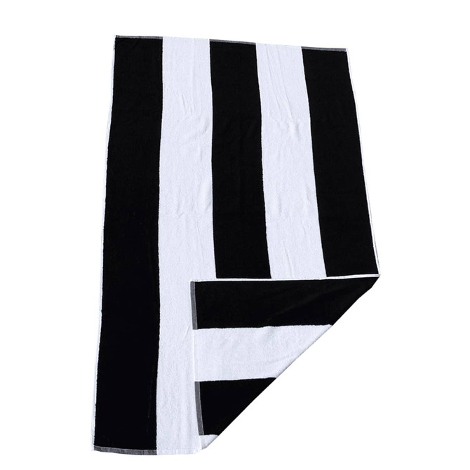 A striped cotton beach towel featuring alternating black and white sections, with a soft texture.
