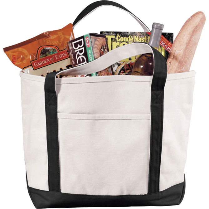 A heavy weight cotton boat tote in cream and black, filled with food items and a drink bottle. It features a logo.