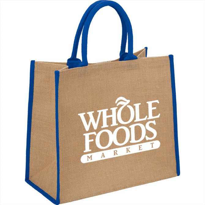 A large jute tote bag in a natural beige colour with blue handles and branding.